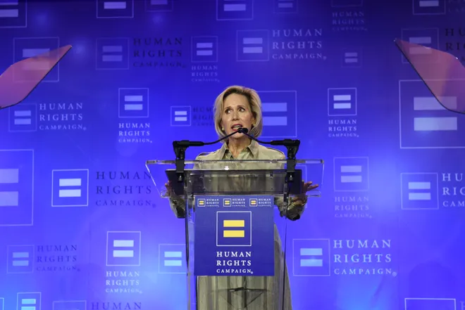 Gwen Walz speaks at Human Rights Campaign dinner in Minneapolis, advocating for LGBTQ+ rights and criticizing Trump and JD Vance.